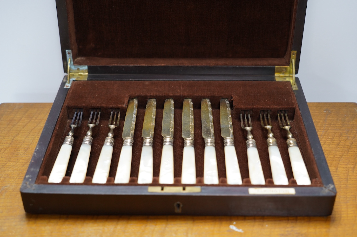 A cased canteen of plated flatware and an Elkington cased set of fruit knives and forks. Condition - fair